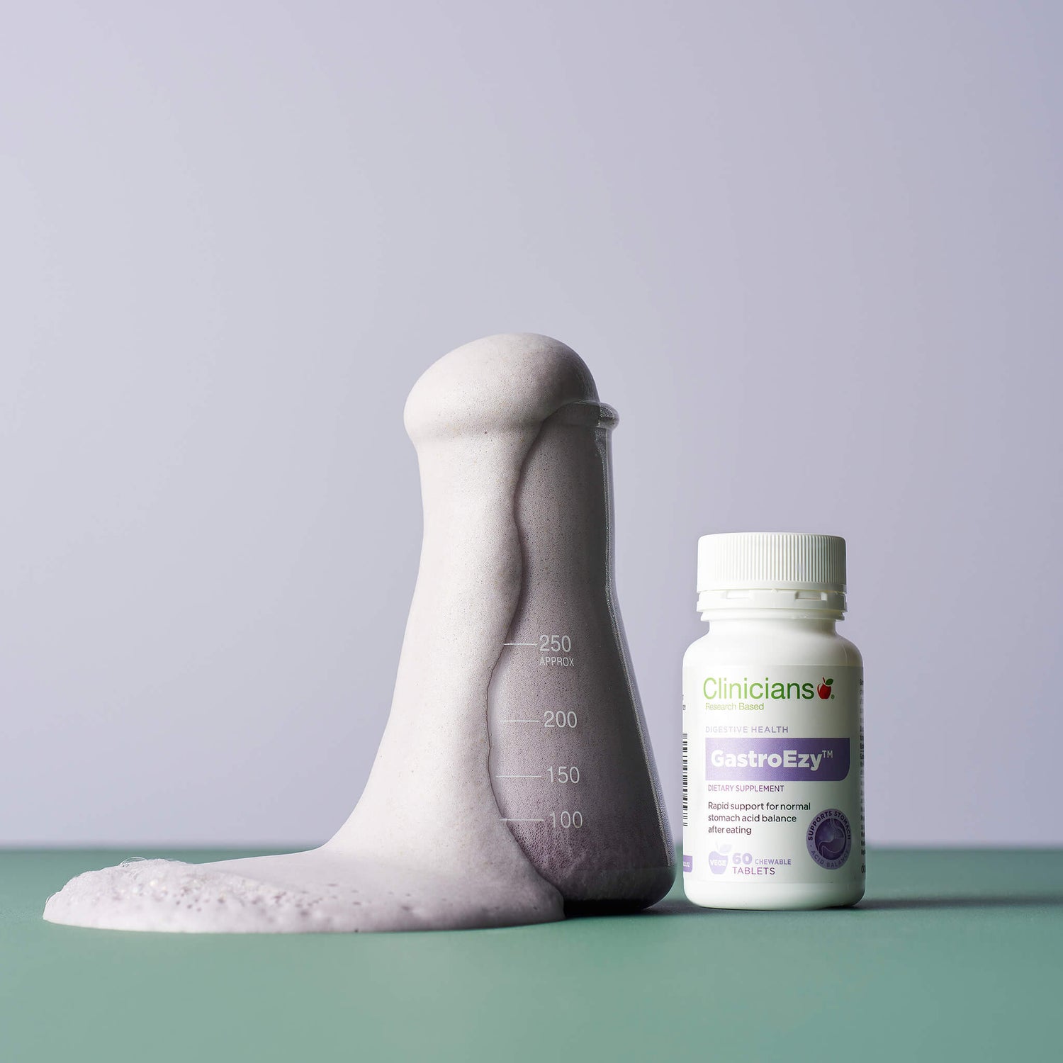 Product packaging with foam coming out of beaker